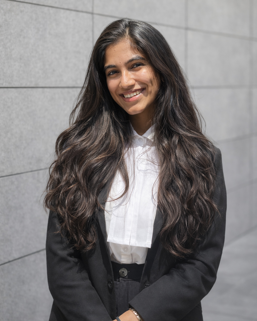 Placeholder portrait (sample stock photo, to be replaced with Ritu Ajwani's photograph)